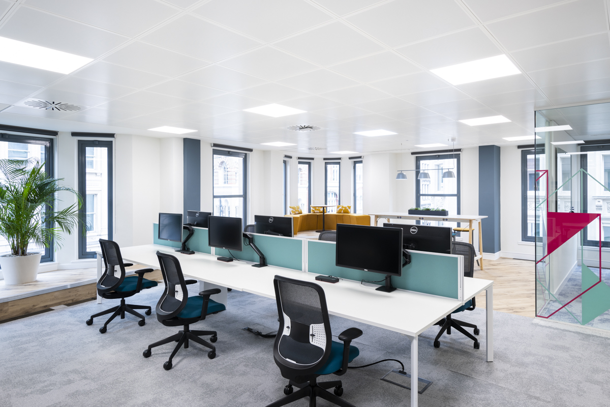 Office showing individual environmental controls and personal items