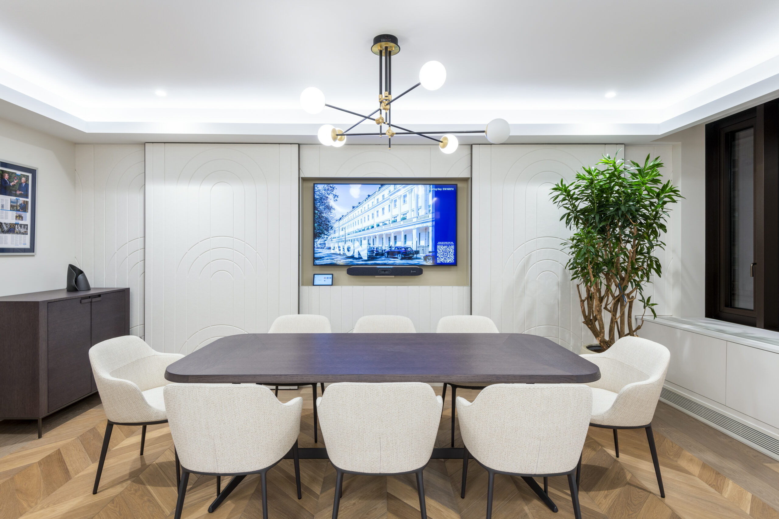 Eastdil Office Workspace with modular desks, standing tables and integrated greenery