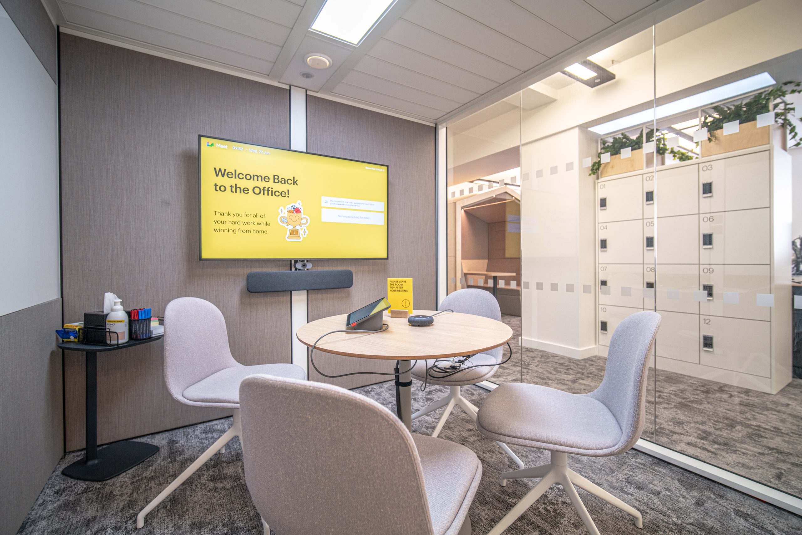 Private meeting space with personal storage lockers